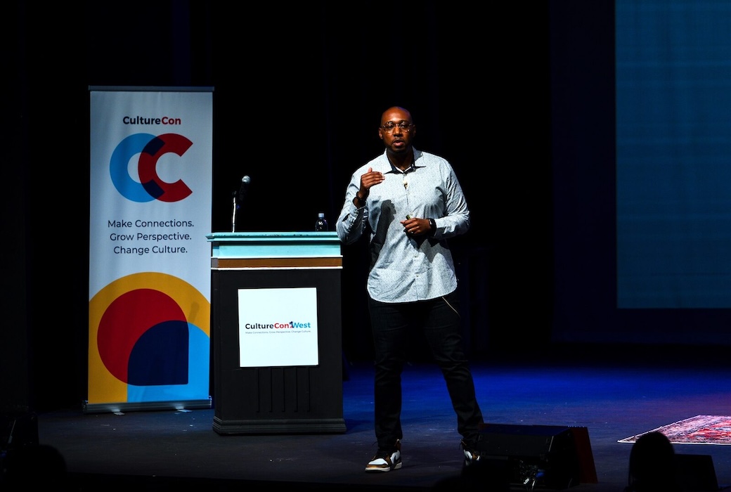 Willie Jackson speaking on stage delivering a keynote address